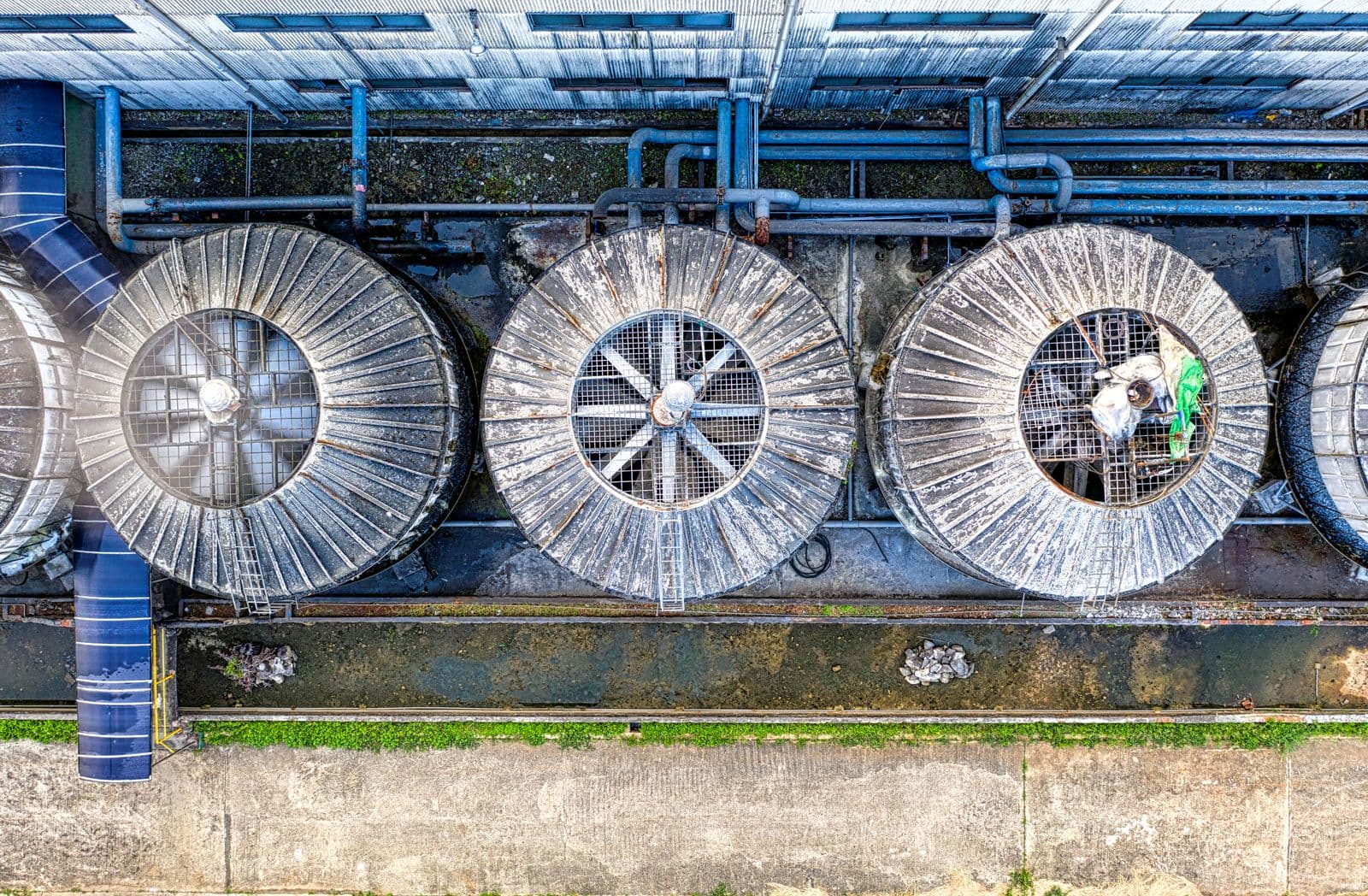 Industrial cooling tower fans on a chiller plant viewed from above