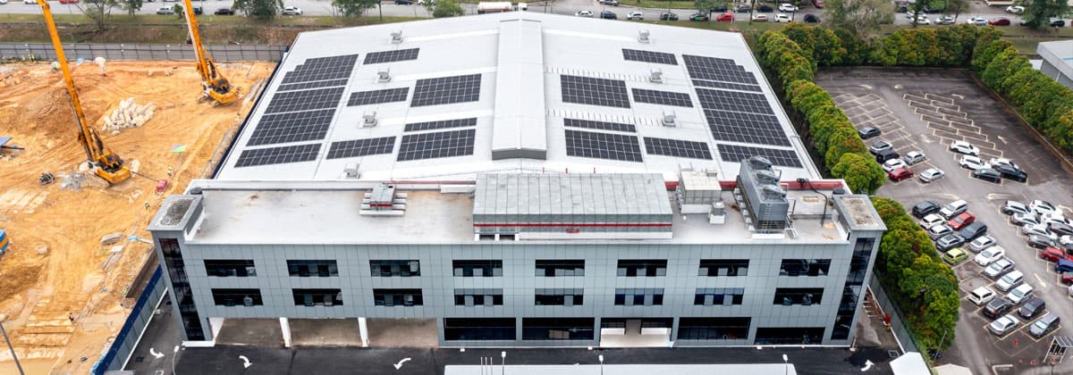 Aerial view of the CapitaLand DC Glenmarie logistics facility with rooftop solar