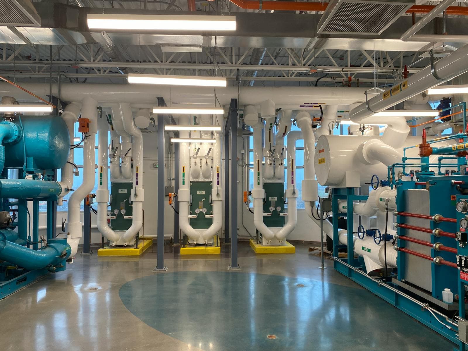 Building services plant room with chillers, pumps and heat exchangers