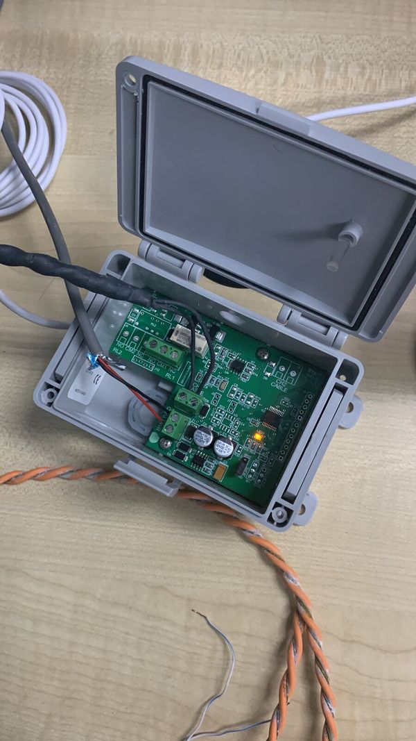 LoRaWAN Modbus controller circuit board wired to sensor cabling